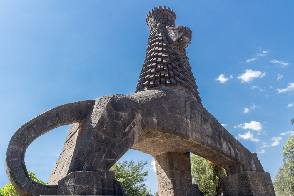 Panoramic view of Addis Ababa's cityscape, blending modern architecture with lush hills, capturing the essence of Ethiopia's bustling capital.